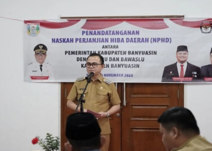 Pj Bupati Banyuasin Menandatangani NPHD Bersama KPU dan Bawaslu untuk Pemilu 2024