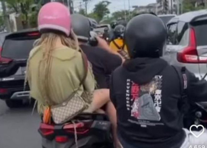 Viral! Pasangan Turis Asing Tenggak Minuman Keras saat Berkendara, Kepolisian Bali Segera Bertindak