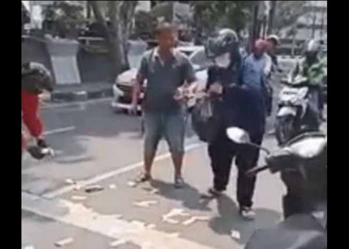 Kejadian di Kota Medan: Uang Jutaan Rupiah Berhamburan di Jalan Protokol, Reaksi Pemotor Bikin Heboh!